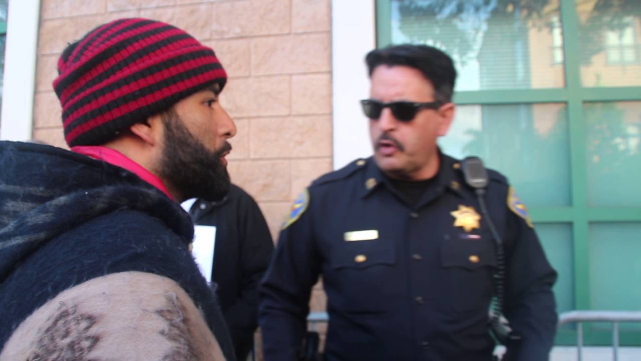 newspaper mockup Edwin Lindo Confronts Officer Daniel Parea outside Mission Police Station