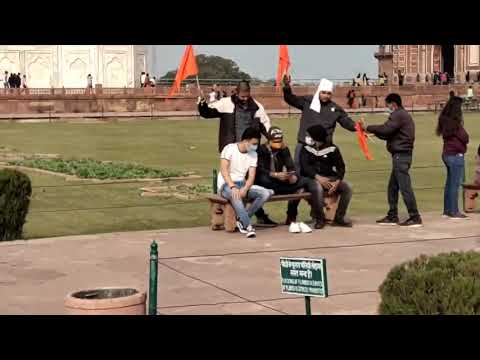 4 men arrested for waving saffron flags at Taj Mahal.