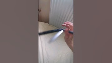 behind the 8 balls (slow motion) (balisong/butterfly knife tricks)