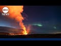 Northern Lights shine over volcano in Iceland in timelapse video