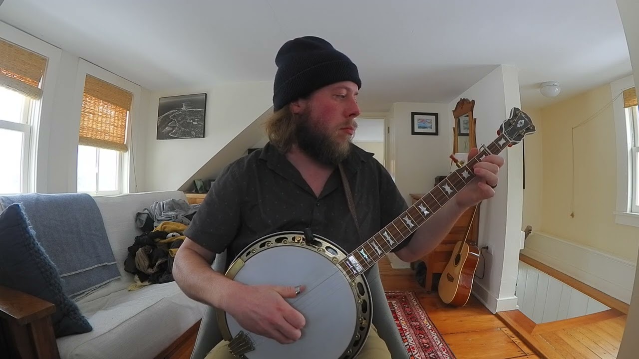 Thomas Bryce warms up for a gig with "Old Home Place" on his Hawthorn RB-7 Style Banjo