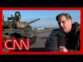 Russian tanks roll past CNN reporter as they appear to head towards Ukraine
