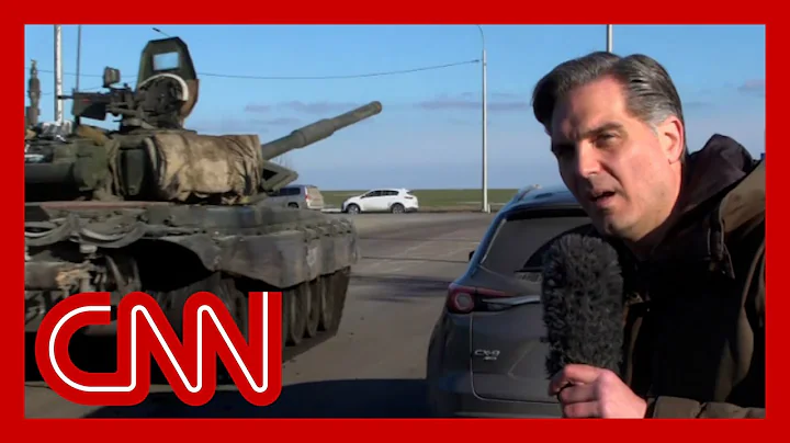 Russian tanks roll past CNN reporter as they appear to head towards Ukraine - DayDayNews