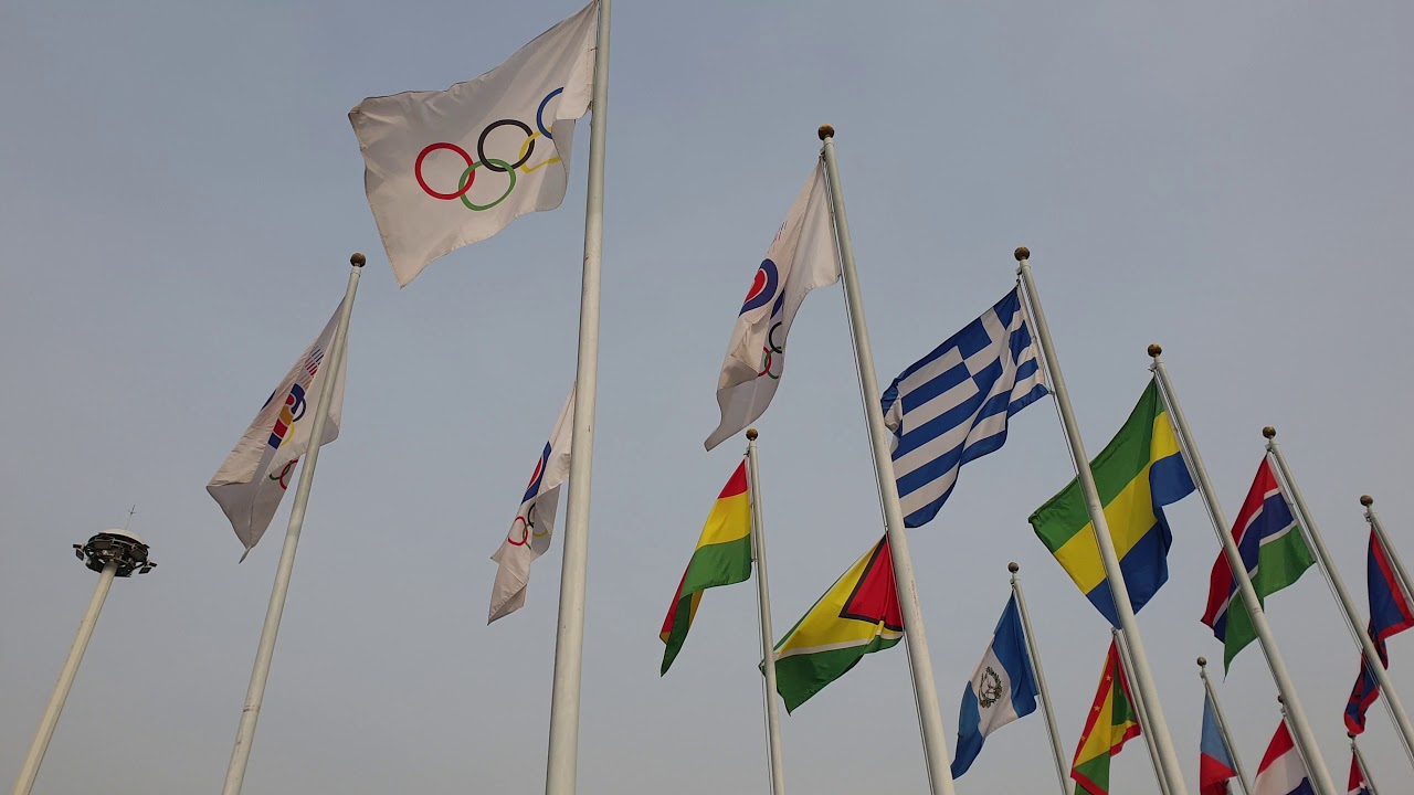 The Olympic flag waving in the wind - YouTube