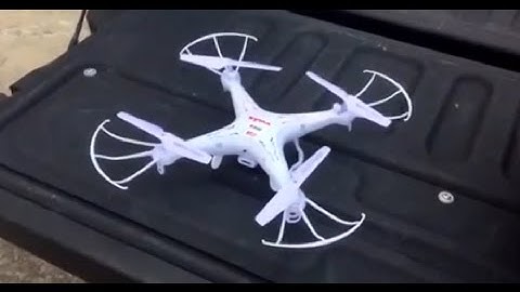 First (Windy) Day Flight with Syma X5C-1. Video Test w/ Flips!