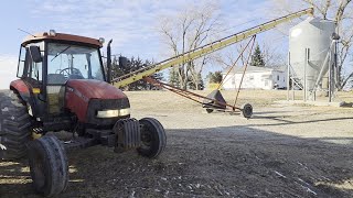 "New" Red Tractors Filling Bulk Bins with Corn to Feed Hogs