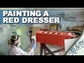 Painting and distressing a red dresser