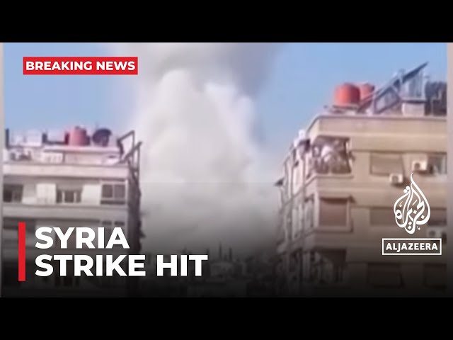 Syrian state media is reporting that a strike has hit a residential building class=