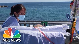 Barcelona Hospital Brings Coronavirus Patients To Beach | NBC News NOW