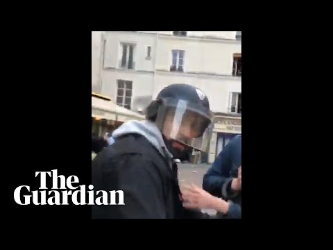 Macron's security officer filmed beating protester