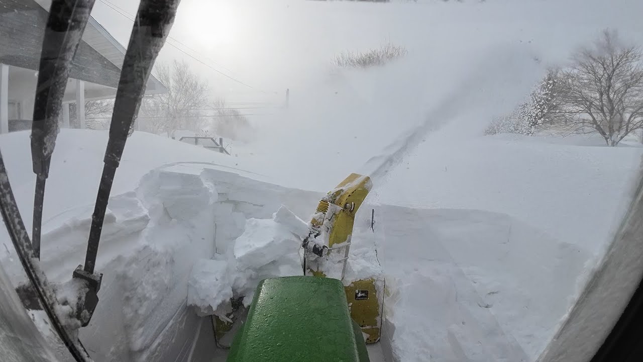 Blizzards dropped 3 feet of snow in 4 days. How to clear 5 foot snowdrifts with the John Deere 322?