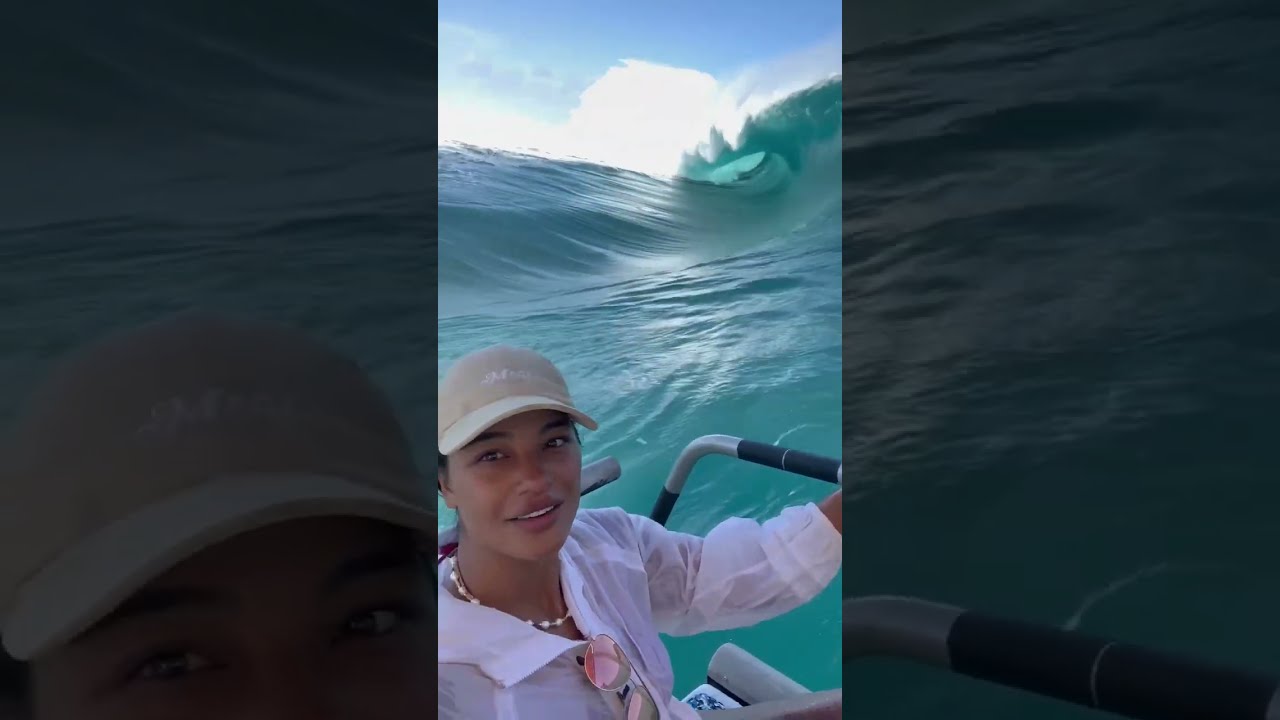 Huge surge wave nearly takes boats and people with it