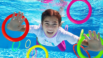 Artem dạy Mia các quy tắc an toàn ở bể bơi