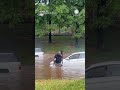 Brave Bystander Rescues Driver Trapped in Flood