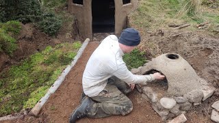 dugout shelter ,bushcraft ireland, clay pizza oven