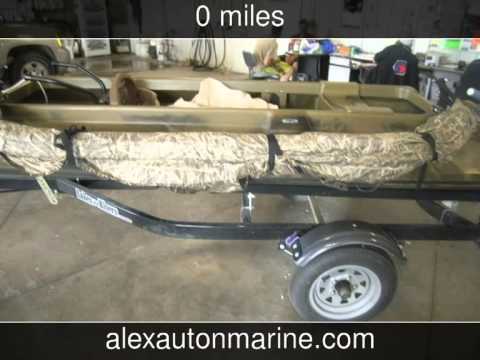 2010 CARLSON CANVASBACK DUCK BOAT/6HP EVIN with blind 