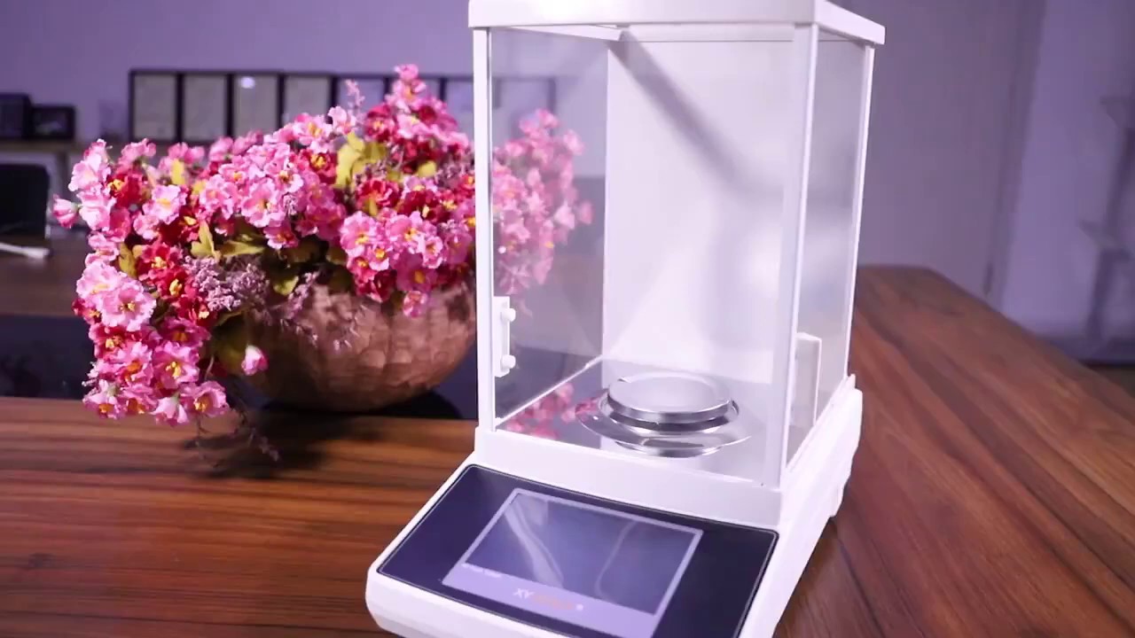 Touch system internal calibration analytical balance