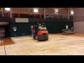 How go drive a fork lift on a gym floor