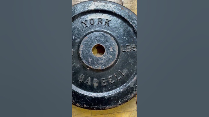 100 lb. York Barbell Plate - John Wood