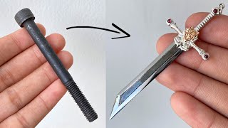 Sword pendant out of black bolt - handmade mini sword