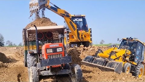 Jcb 3dx Backhoe Loader Machine Loading Red Soil In Swaraj Tractor | Jcb Backhoe video  