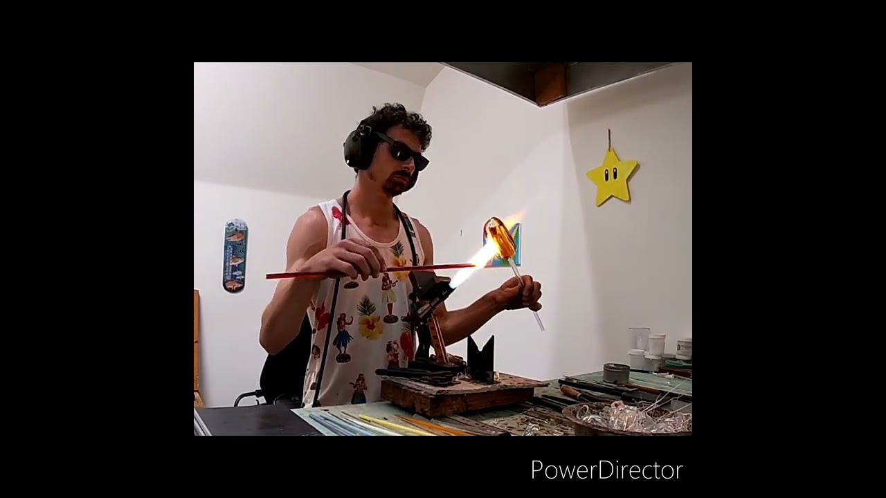 Glassbowing, creation of lined tubing from color rods. Music by me.