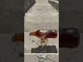 A hand enters from t #asmr #bottlebreak #glassbreaking #oddlysatisfying #satisfying #slowmotion