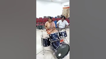 Thumbnail of Girl playing drums rolls