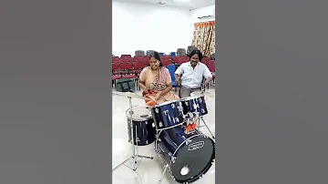 Girl Playing Drums Rolls 