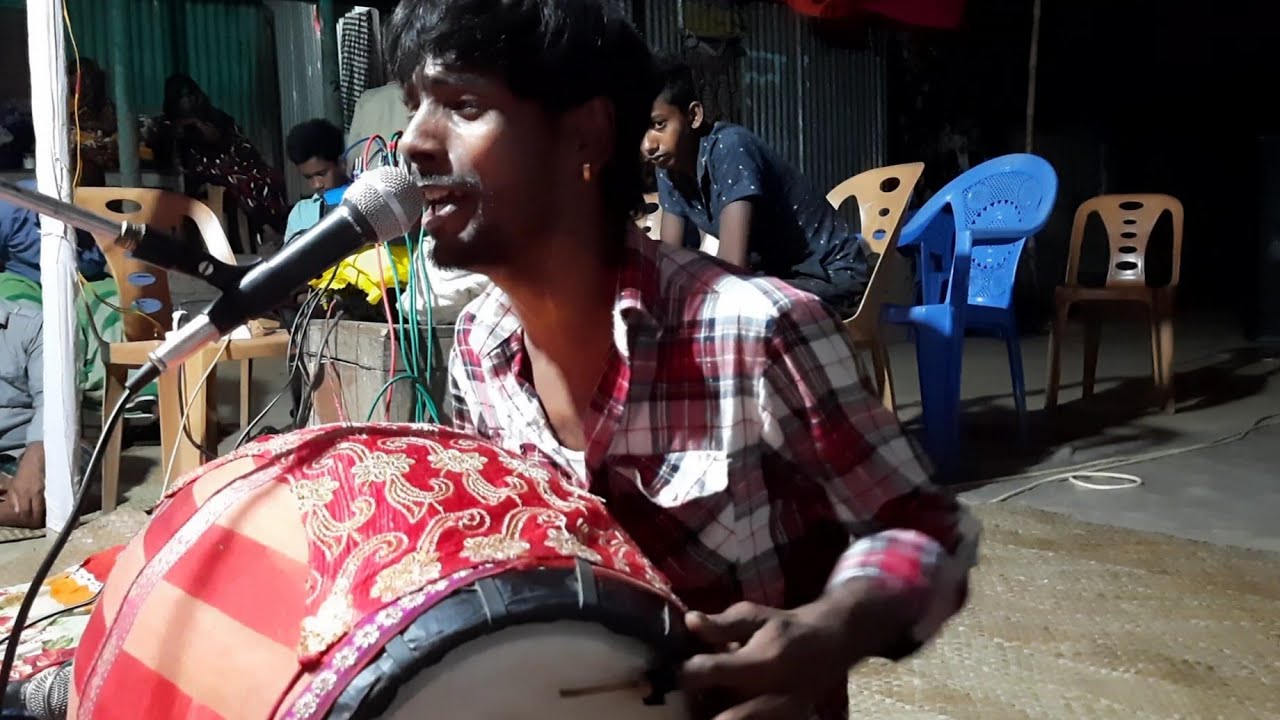 The song of the drummer playing the drum Dhol Bajiye Dhuli Badoker Gan  Sikandar Dhuli