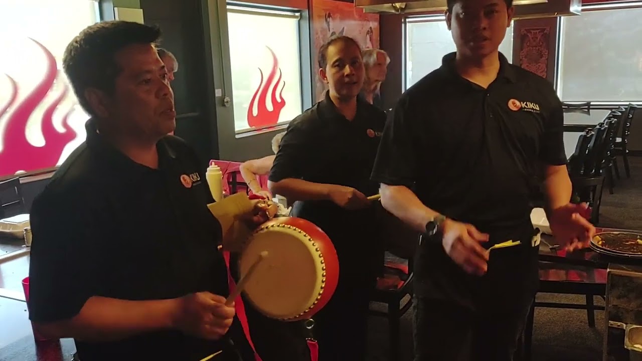 singing happy birthday with the restaurant staff at mom's 90th birthday party