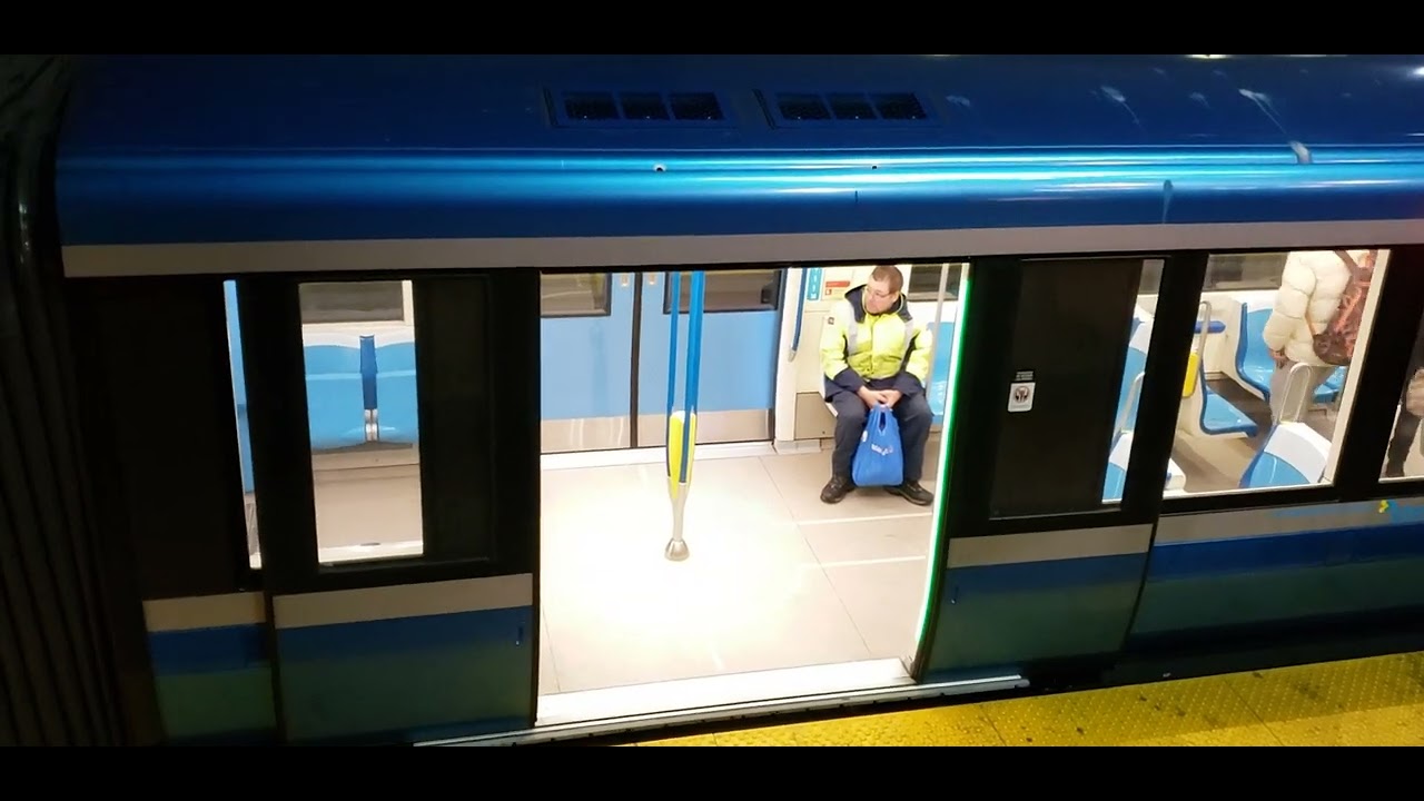 MONTREAL METRO  Monk Station Stop Azur Trainset Meet Seen From Staircase With Service Announcment