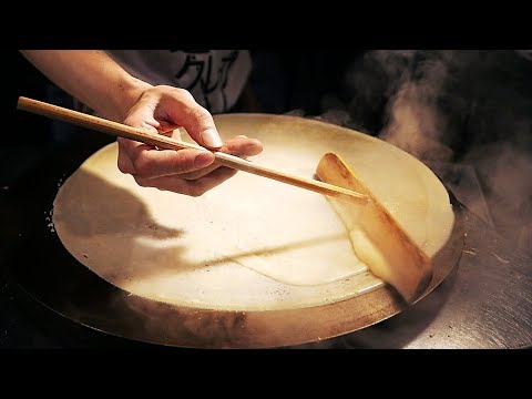 japanese-street-food---crepes,-mochi,-dango,-white-strawberry-osaka-dessert-japan