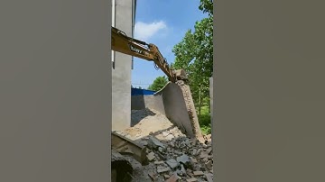 The process of wall demolition. Good machinery makes the work easy