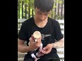 Warm hearted dad online, gently feeding baby monkeys