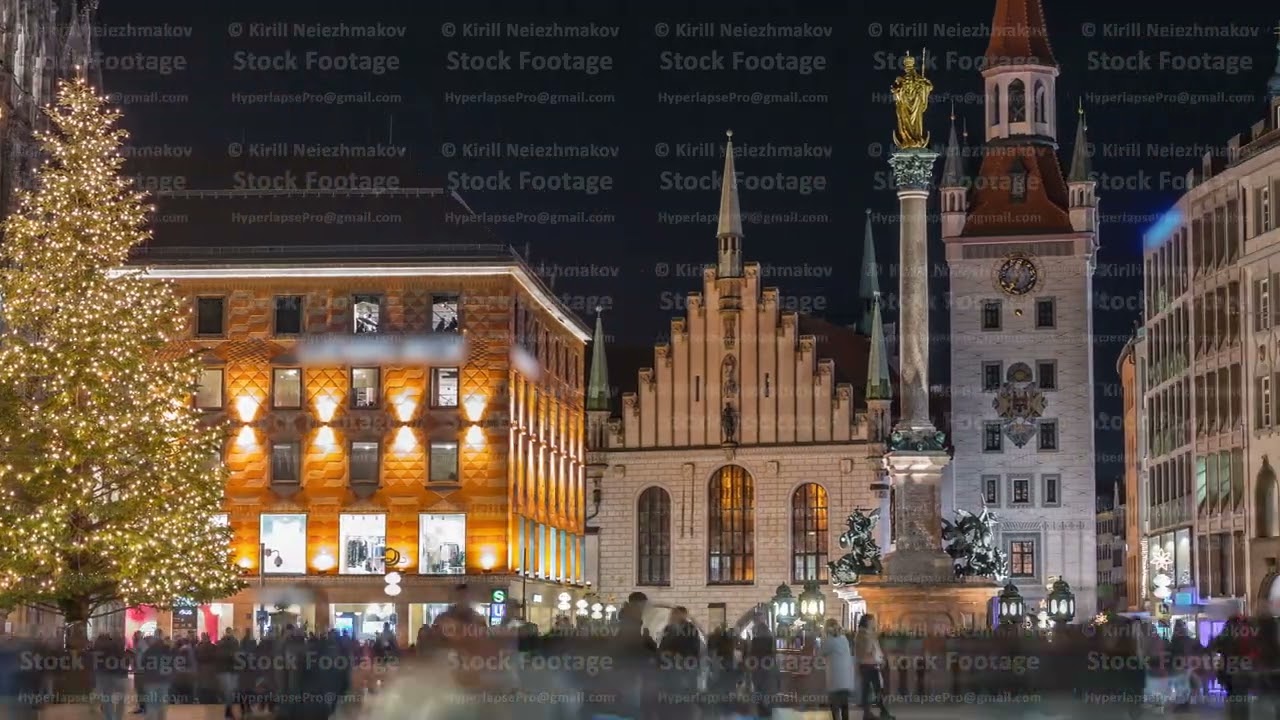 Marienplatz with the old Munich town hall and the Talburg Gate night timelapse, Bavaria, Germany.
