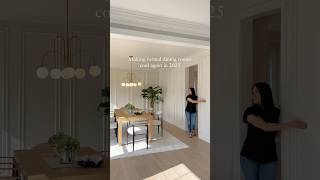 This formal dining room mixes modern with traditional with double wainscoting walls and gold accents This formal dining room mixes modern with traditional with double wainscoting walls and gold accents