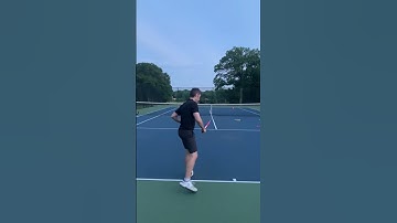 Practicing the kick serve with a cone on your head for the correct motion!