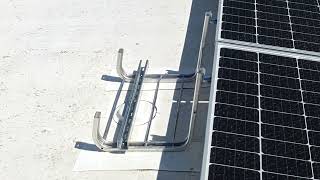 UNIRAC Flashloc attachment for a ballasted racking system.