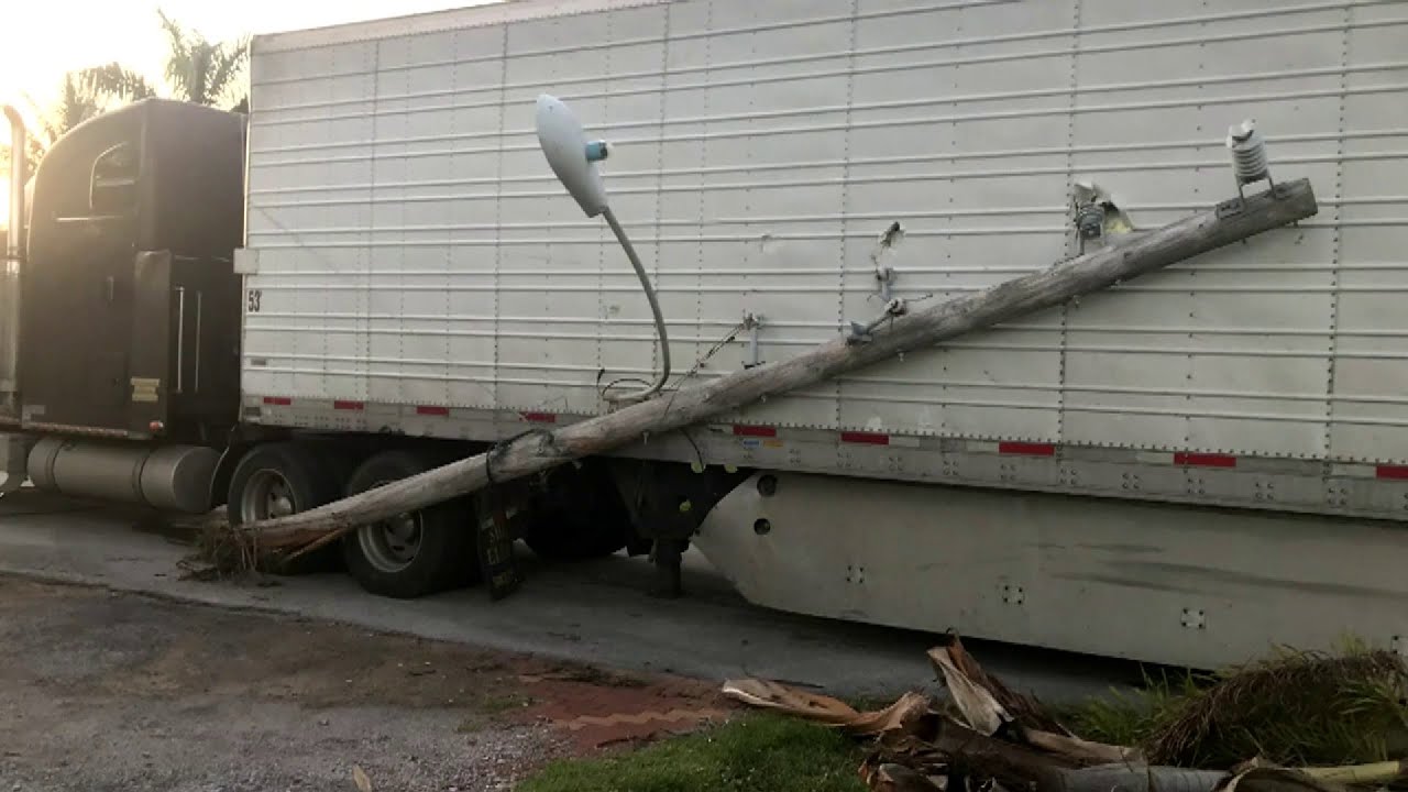 Semi-truck knocks down power lines in Pompano Beach neighborhood - YouTube