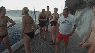 The 2017 CSB/SJU Greco-Roman crew conquers the cliffs of Santorini.