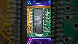 Attaching the N64 RGB flex cable to the MAV-NUS chip under magnification
