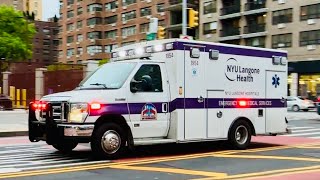 NYU LANGONE HEALTH EMS AMBULANCE RESPONDING ON EAST 14TH STREET IN MANHATTAN, NEW YORK CITY.