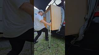 He converted a compact car into an RV.