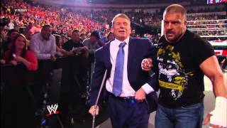 Triple H assists Mr. McMahon backstage after their fight with Brock Lesnar \& Paul Heyman