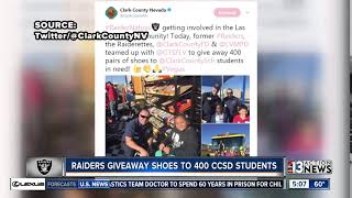 Raiders give shoes to ccsd students