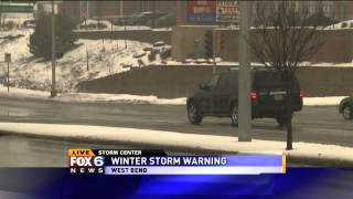 Light snow, wet roads in West Bend