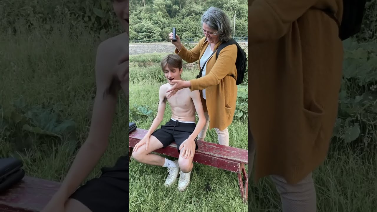 Shirtless boy gets a buzzcut 