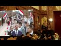 مواطنون يرفعون صور الرئيس وأعلام مصر بكاتدرائية ميلاد المسيح