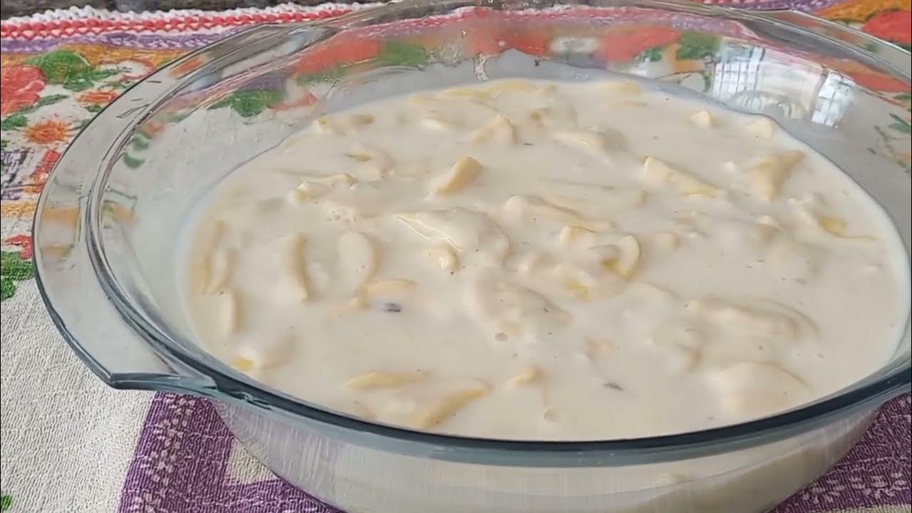 Ravioli ao alho, ervas e molho branco